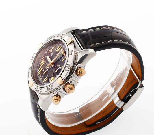 Breitling Chronomat 44 IB0110 18K Gold and Stainless Black & Gold Roman Dial