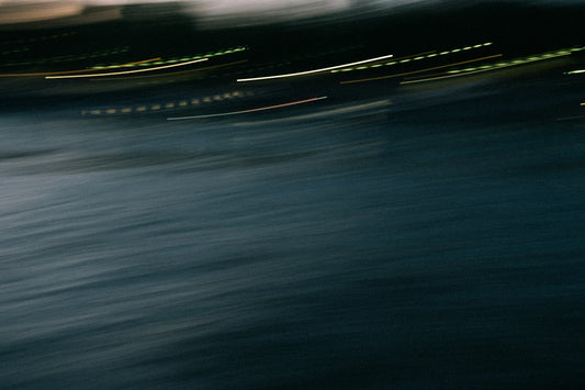 a blurry photo of a boat in the water