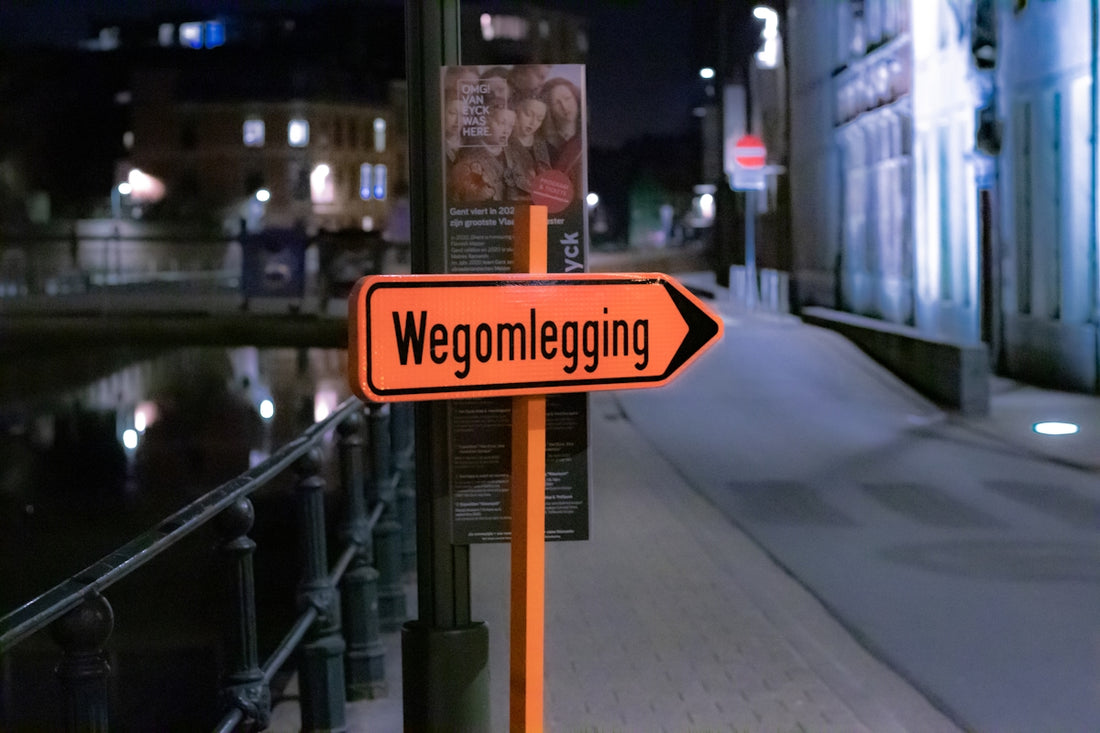 a street sign that is on a pole
