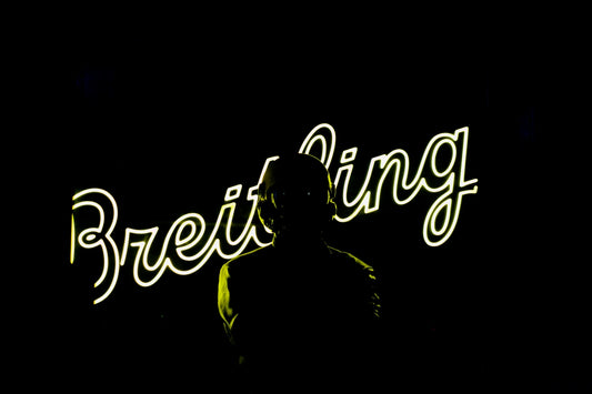 A black and white photo with the words breiting on it