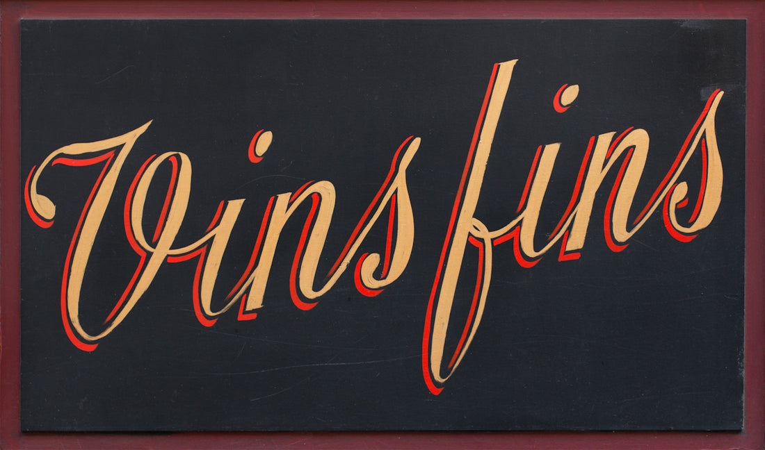 Vinsfins written on a dark background.