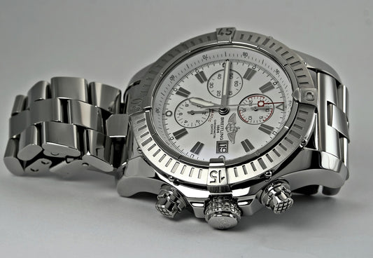 A detailed silver chronograph wristwatch with a metal band