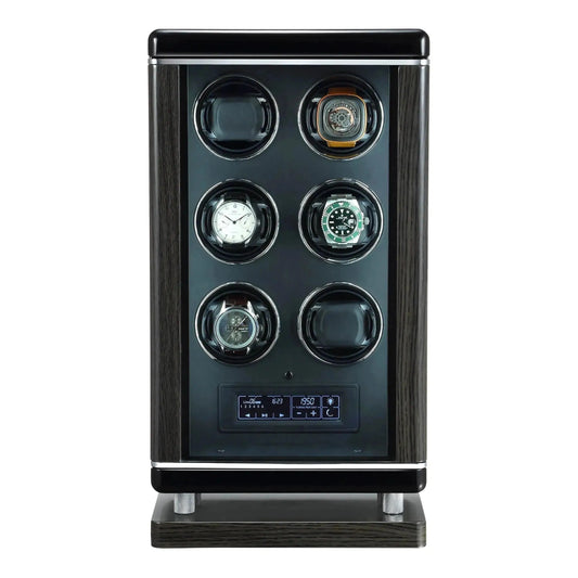 The 6 Watch Winder for Automatic Watches with BioMetric Technology by Tempus features a sleek black and silver vertical case, six circular slots, an electronic control panel, and is crafted by Tempus Luxury Watch Winders.